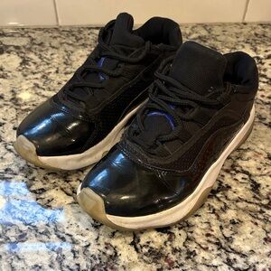 Kids Black Jordan 11s CMFT Sneakers